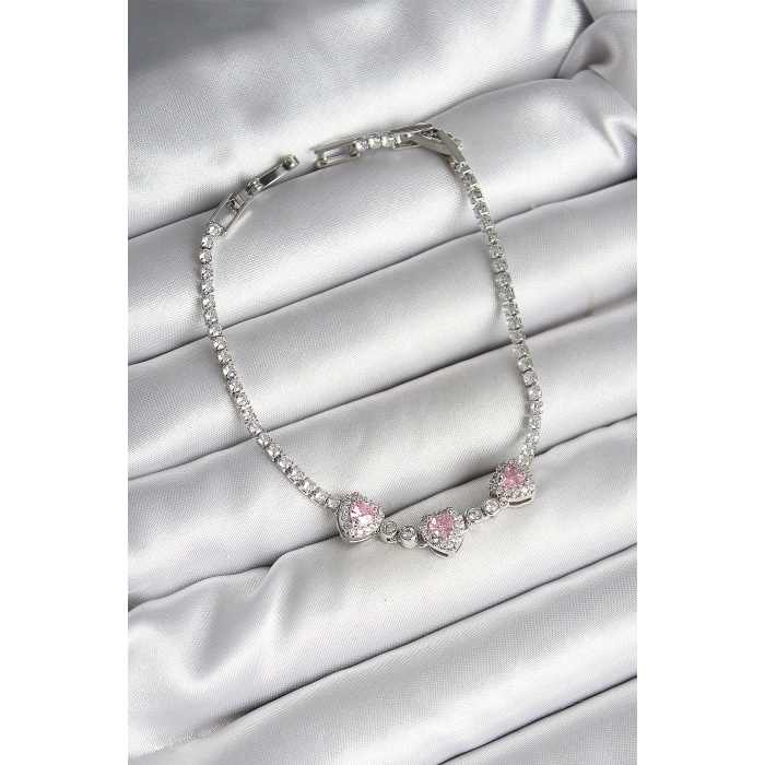 Pirinç Sıralı Pembe Kalp Figürlü Zirkon Taşlı Gümüş Renk Kadın Bileklik - Lisinya