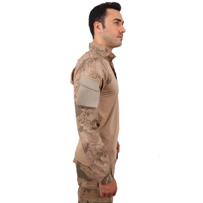 Dört mevsim kullanıma uygun yapısıyla öne çıkan Tactical Combat Tişört Gömlek, konfor ve dayanıklılığı bir araya getirir. Askeri ve outdoor