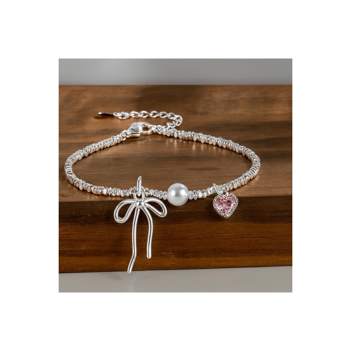 925 Ayar Gümüş Kadın Bileklik Fiyonk Figürlü İnci ve Kalp Taşlı Zarif Tasarım