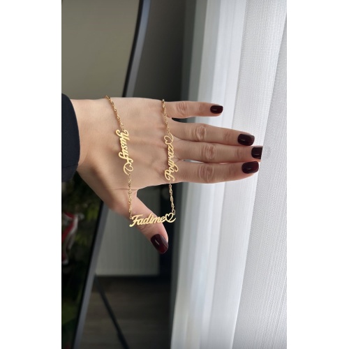 Çelik kalp detaylı isimli üç isimli kolye