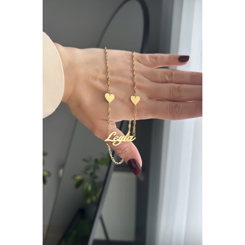 Çelik isimli kalp detaylı kolye