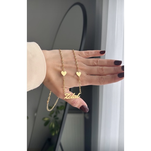 Çelik isimli kalp detaylı kolye