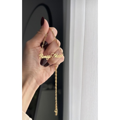 Çelik İki isimli kalp detaylı kolye