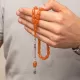 Gümüş Püsküllü Turuncu Kapsül Kesim Sıkma Kehribar Tesbih