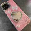 Pembe Renk Kalp Ve Kurdele Figürlü Ayna Detaylı 15 Pro Max Telefon Kılıfı