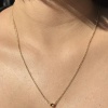 Altın Renk Top Detaylı Kolye