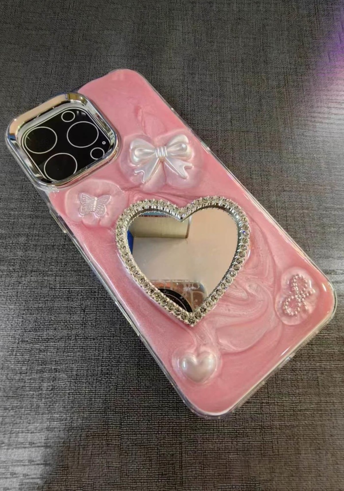 Pembe Renk Kalp Ve Kurdele Figürlü Ayna Detaylı 14 Pro Max Telefon Kılıfı
